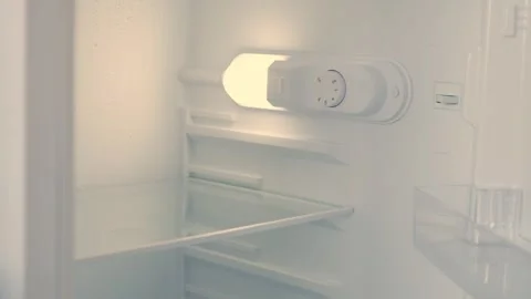 Man Hand Opens an Empty Fridge Door Looking Inside for Fresh Food and Drink. Stock Footage 312119952