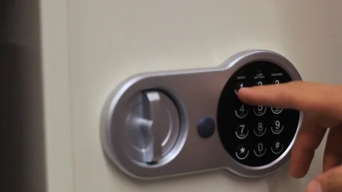 Man hand opens a key safe Stock Footage 112059474