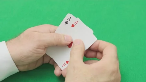 Man hand opens poker combination of two pairs Stock Footage 265880239