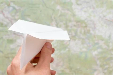 Man hand with paper plane Stock Photos