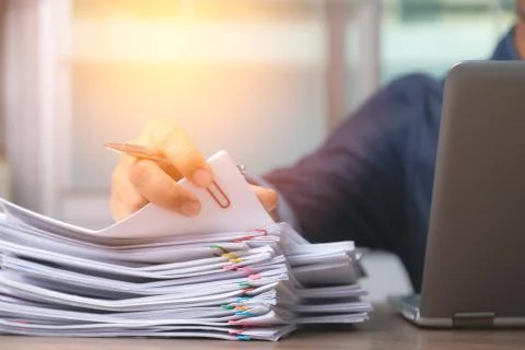 Man hand with pen Picking document For working from home, concept of social d Stock Photos