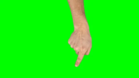 Man hand is performing swipes left and right at tablet screen gesture on green Video stock 128677004