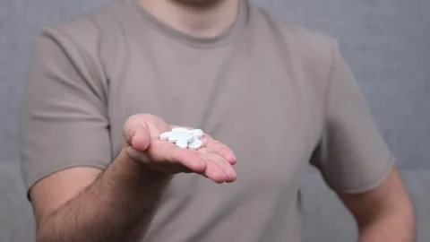 Man hand pills Video stock 269676242