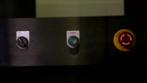 Man hand pressing digital on off start power emergency stop button knob metal st Stock Footage 138773956