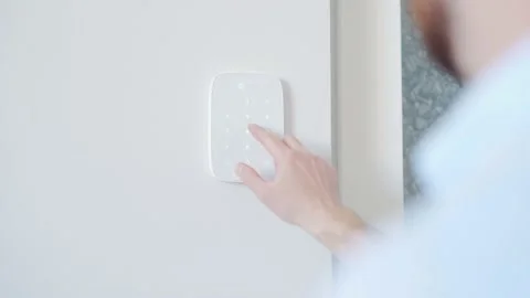 Man hand pressing the security code combination to unlock the door. Businessman  Stock Footage 195183630