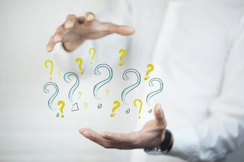 Man hand question marks Stock Photos