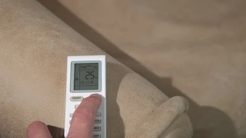 Man hand raising temperature at home. Stock Footage 291725832