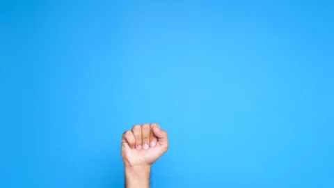 Man hand rising on blue screen and showing thumbs up sign Stock Footage 91319772