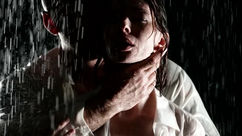 A man hand roughly caresses the face and neck of his beloved woman at night in 스톡 동영상 246633792