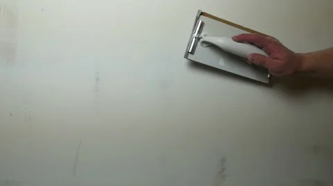 Man Hand Sanding Plaster Wall Stock Footage 47163266