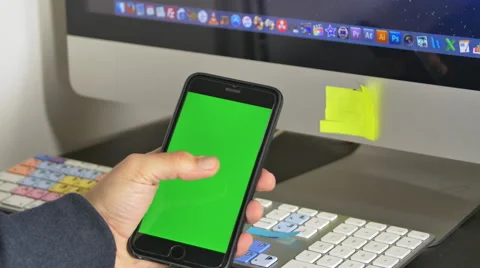 Man Hand Serching For An App In His Smartphone, Flipping Pages, Green Screen Stock Footage 64044705