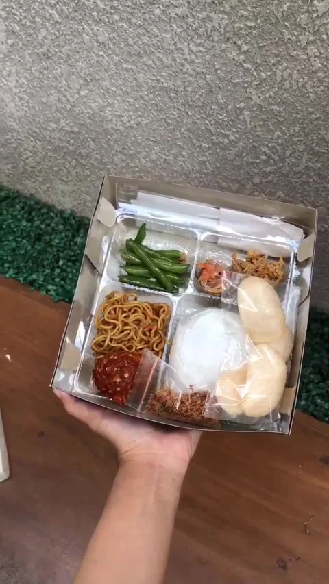Man Hand showing rice box for Ramadan and IED Mubarak Stock Footage 299849093