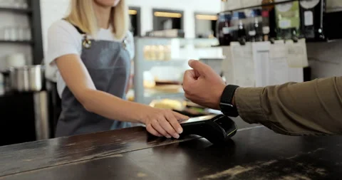 Man hand with smartwatch using terminal for payment, non-cash transaction, side Stock Footage 159562642