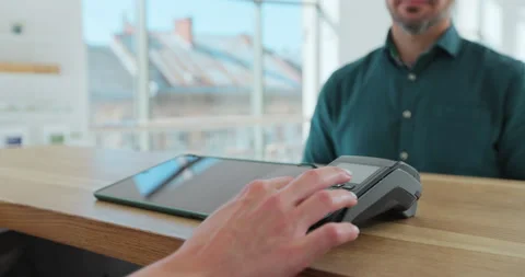 Man hand with smartwatch using terminal for payment in coffee shop, non-cash Stock Footage 203893974