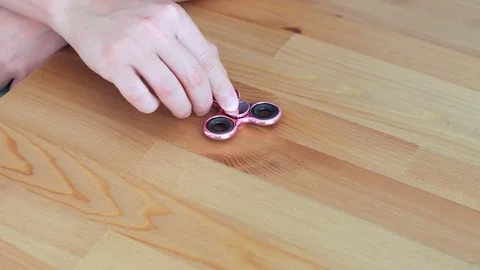 Man hand with spinner Stock Footage 77213809