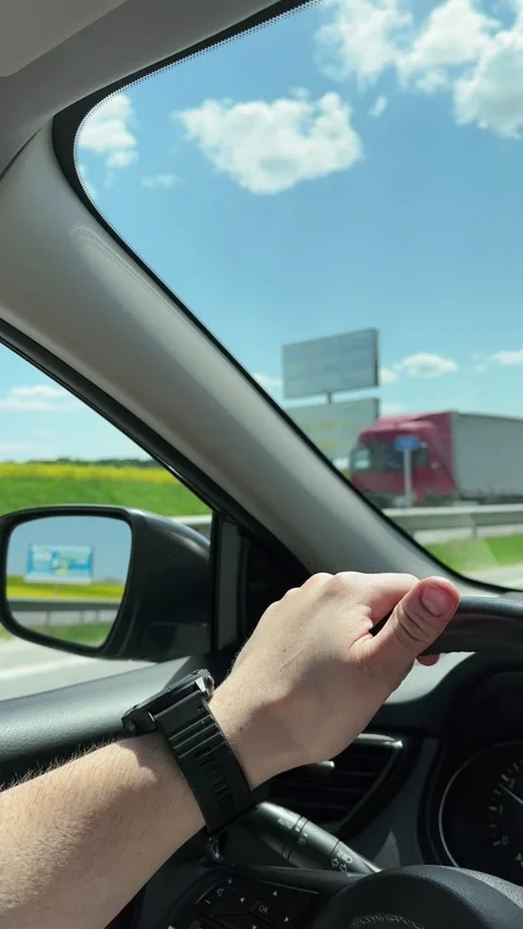 Man hand on steering wheel Stock Footage 247071979