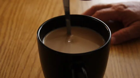 Man hand stir cup of coffee Stock Footage 32220022