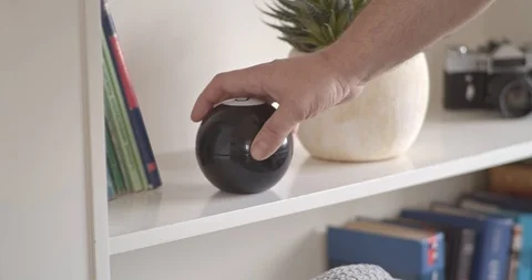 Man hand take Magic 8 ball Stock Footage 108033914