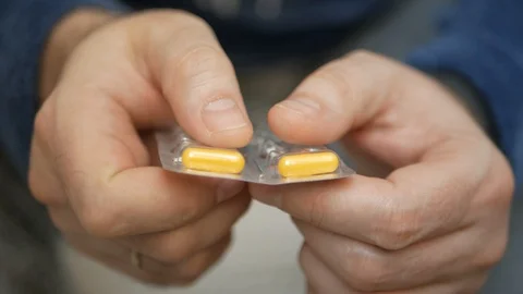 Man hand take pills from blister pack. Stock Footage 127781453