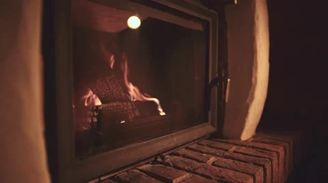Man Hand taking Cup of Hot Drink, Relaxing Near the Burning Fireplace, 4K. Stock-Footage 66730767