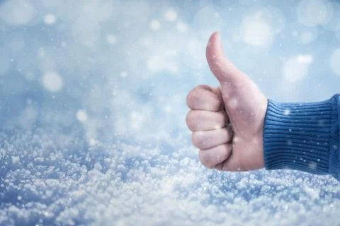 Man hand with thumb up Stock Photos