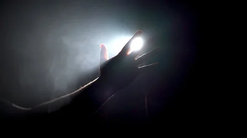 Man hand touches the light in the dark Video stock 109797679