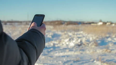 Man Hand Touching Screen Modern Smartphone Winter Stock Footage 62284323