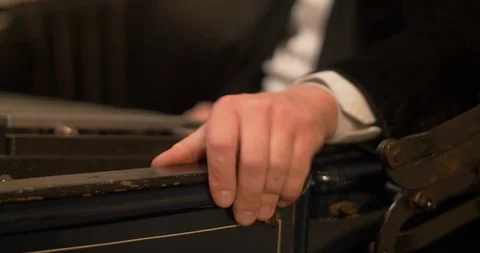 Man hand trying to close the door of a very old car Stock Footage 106528582