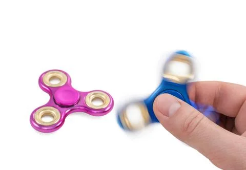 Man hand twists the spinner Stock Photos