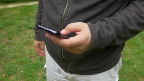 Man Hand Types The Text On Mobile Phone Stock Footage