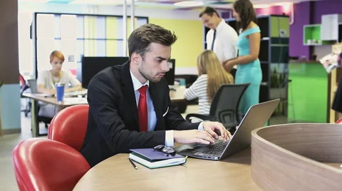 Man hand typing on keypad of his laptop. Man is working in office at computer. Stock Footage 66299461