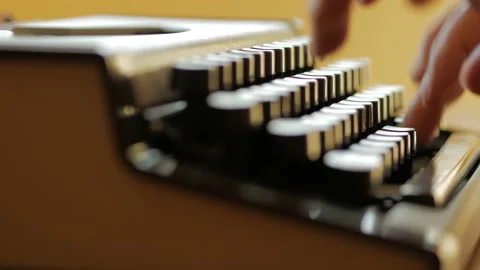 Man hand typing an old typewriter machine (close up) Stock Footage 130793796