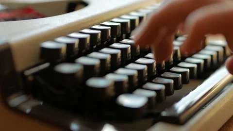 Man hand typing an old typewriter machine (close up) Stock Footage 130793824