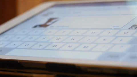 Man hand typing a tablet computer Stock Footage 37158139