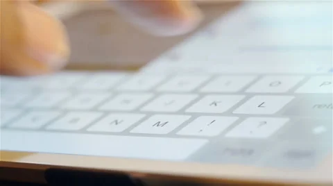 Man hand typing a tablet computer Stock Footage 37158157