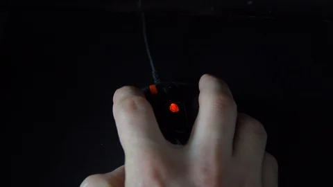 A man hand uses mouse. Guy arm clicks on the mouse buttons close up Stock Footage 126093070