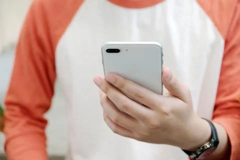 Man hand using black smart phone, people on phone, technology and lifestyle Stock Photos