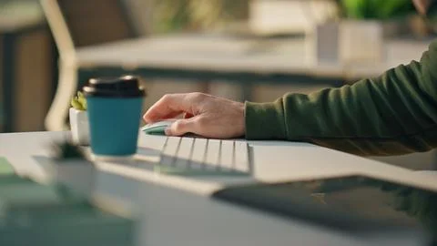 Man hand using computer mouse working at room closeup. Web designer at keyboard Foto stock