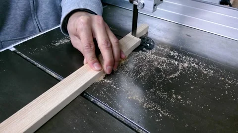 Man hand using electric saw machine sawing wood Stock Footage 46836155