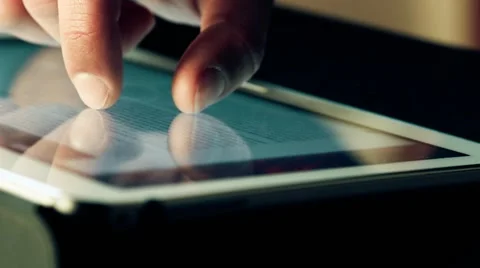 Man hand using finger for touching tablet computer pc touchscreen Stock Footage 48537641
