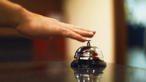 Man hand using ringing service bell urgency blur background hotel reception Stock Footage 82364813
