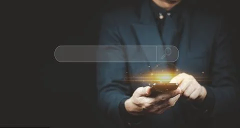 Man hand using smartphone to use search engine optimization (SEO) tools for f Stock Photos