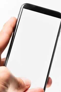Man hand using smartphone on white background. Closeup shot of man hand holdi Stock Photos