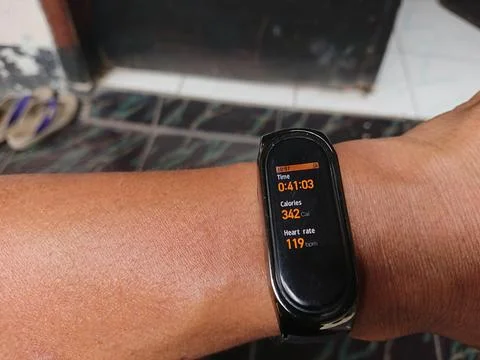 Man hand using smartwatch, calorie, duration, time, heart rate counted Stock Photos