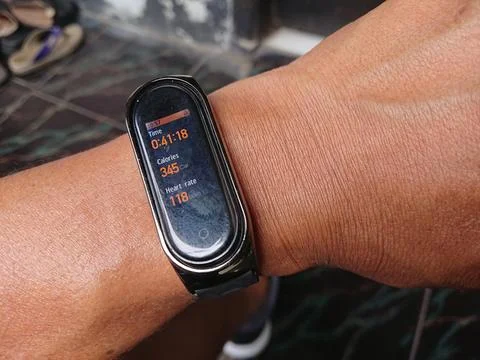 Man hand using smartwatch, calorie, duration, time, heart rate counted Stock Photos