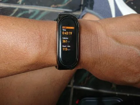 Man hand using smartwatch, calorie, duration, time, heart rate counted Stock Photos
