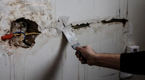 Man hand using spatula Stock Photos