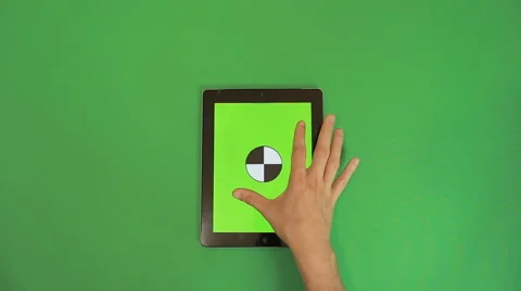 Man Hand Using Tablet with Green Screen Zoom In on the Green Background Stock Footage 66298411