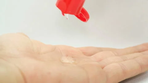Man hand view while disinfecting with alchool gel sanitizer,covid19 pandemic 4k Stock Footage 143292660