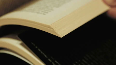 Man hand while reading book in leisure time,knowledge in lockdown,leisure time Stock Footage 150727229